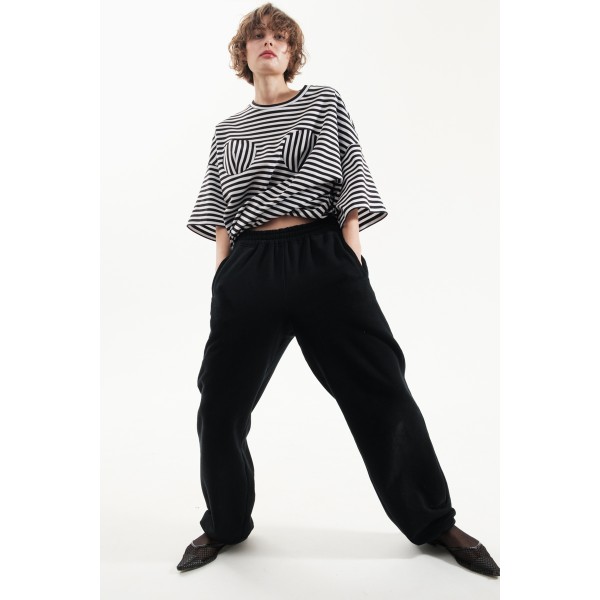 Black trousers with fixings